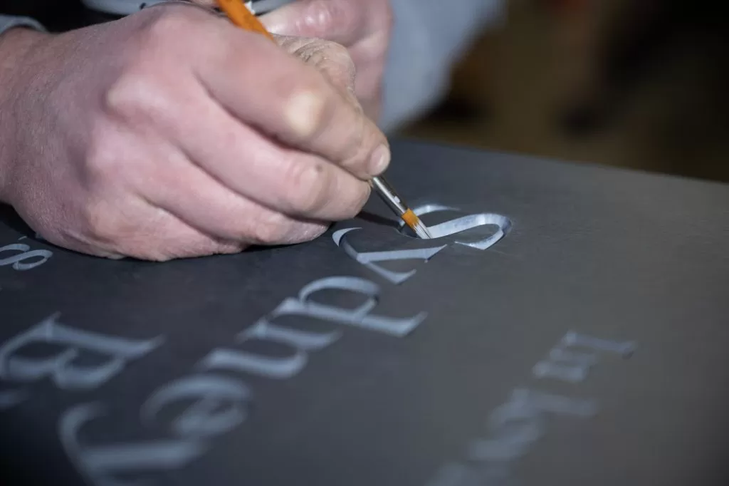 V-cut memorial lettering